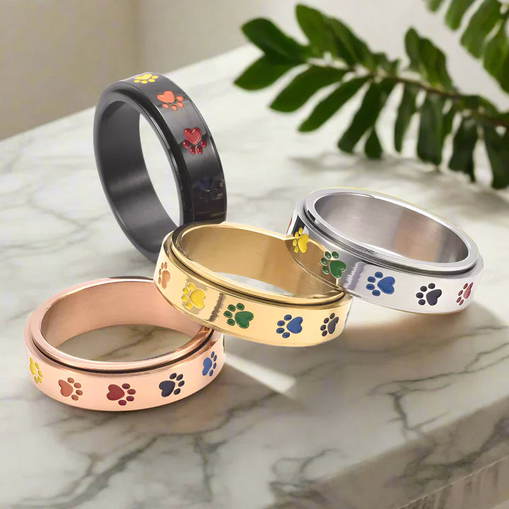 Anillo Giratorio para Reducir el Estrés – Acero Inoxidable con Huellas Arcoíris