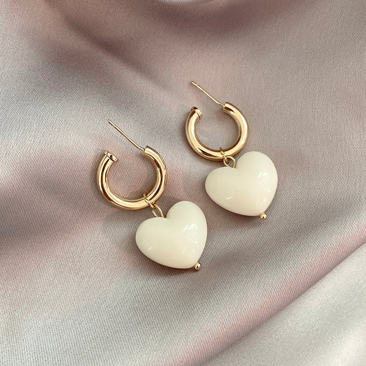 Pendientes Corazones Blancos en Oro