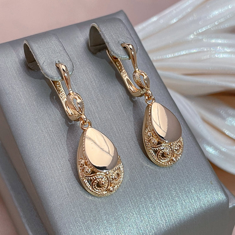 Pendientes colgantes chapados en oro