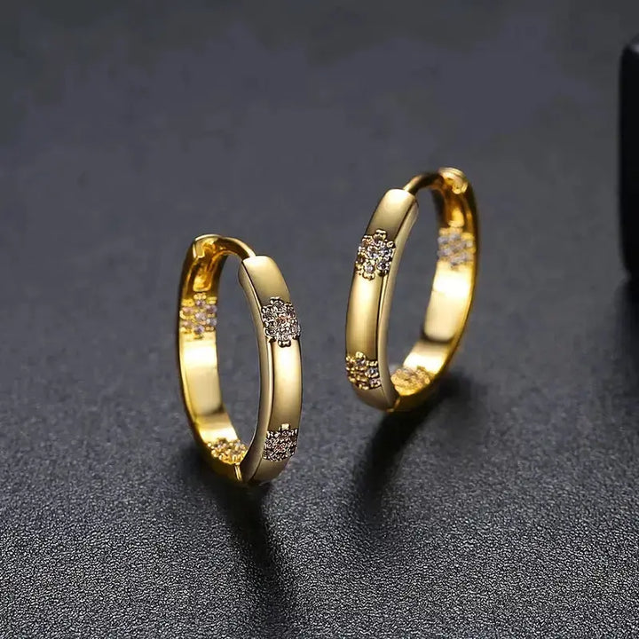 Pendientes de aro vintage con flor dorada