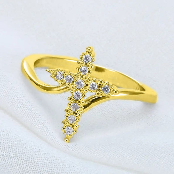 ANILLO CRUZ DE PLATA CUBIERTO DE CIRCONIO