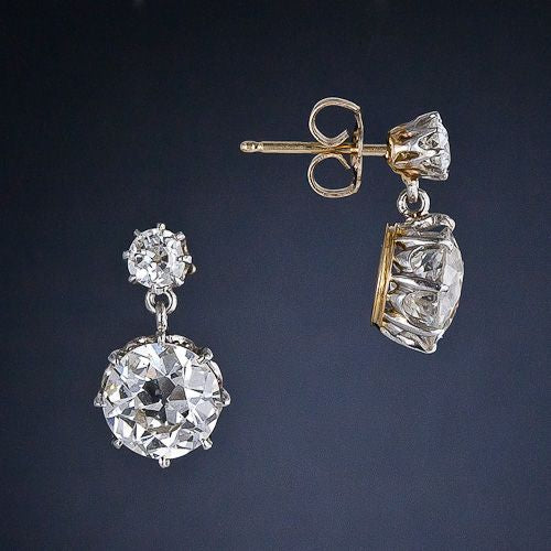 Pendientes dorados con circonita redonda