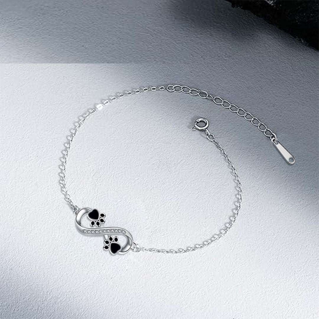 Pulsera con Símbolo de Infinito y Colgante de Huella con Circonitas