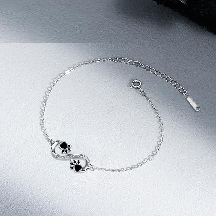 Pulsera con Símbolo de Infinito y Colgante de Huella con Circonitas