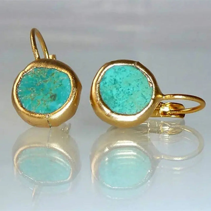 Pendientes dorados con piedra turquesa