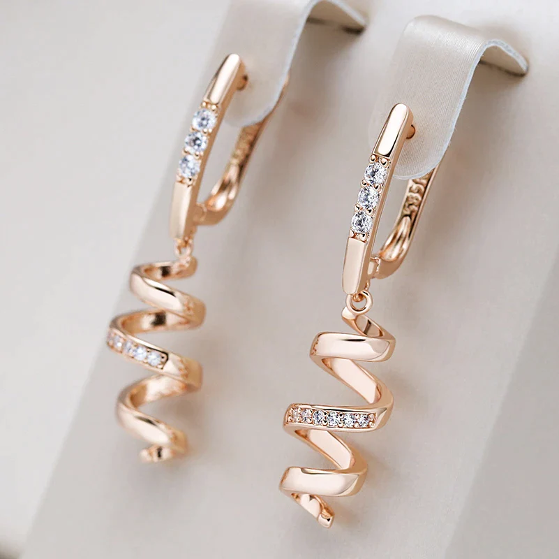 Pendientes Elegantes de Espiral en Zirconia Dorada