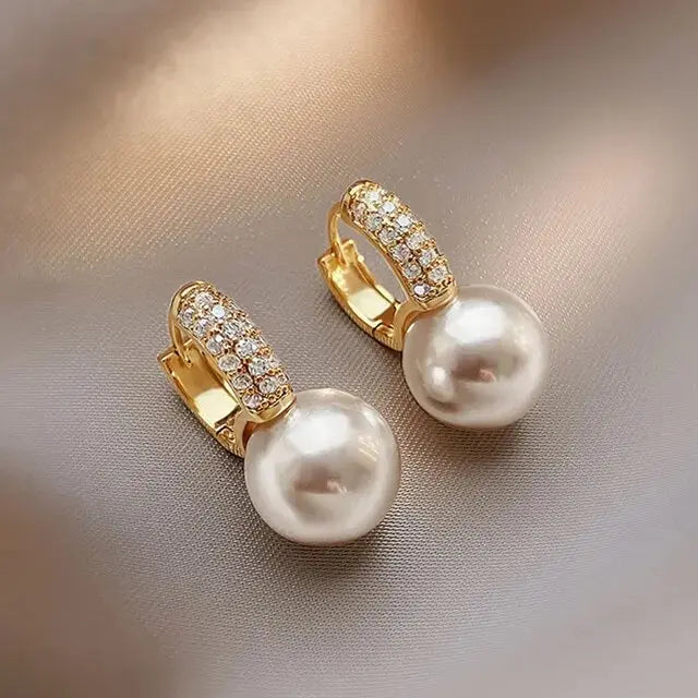 Pendientes de perlas con pedrería
