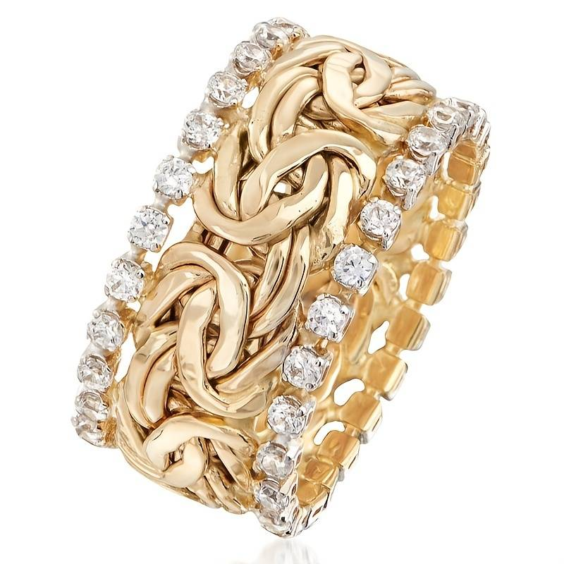 Anillo vintage dorado trenzado con circonita