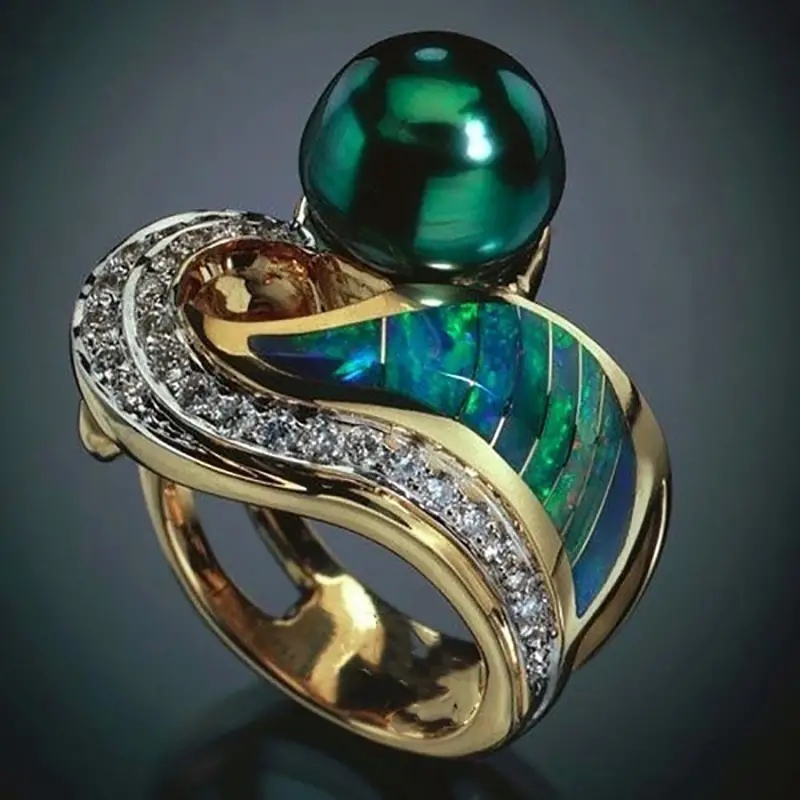 Anillo vintage con circonita verde perla