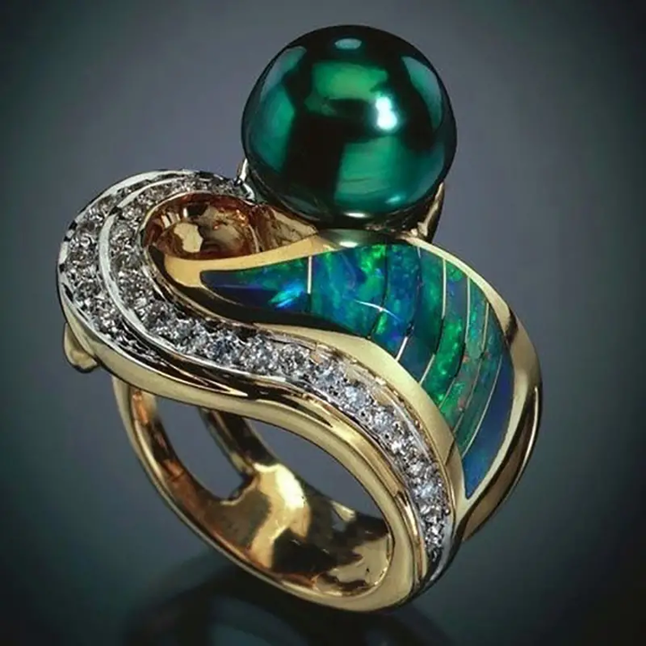 Anillo vintage con circonita verde perla