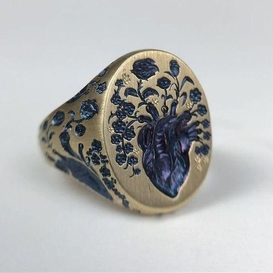 Anillo vintage con flor azul en oro