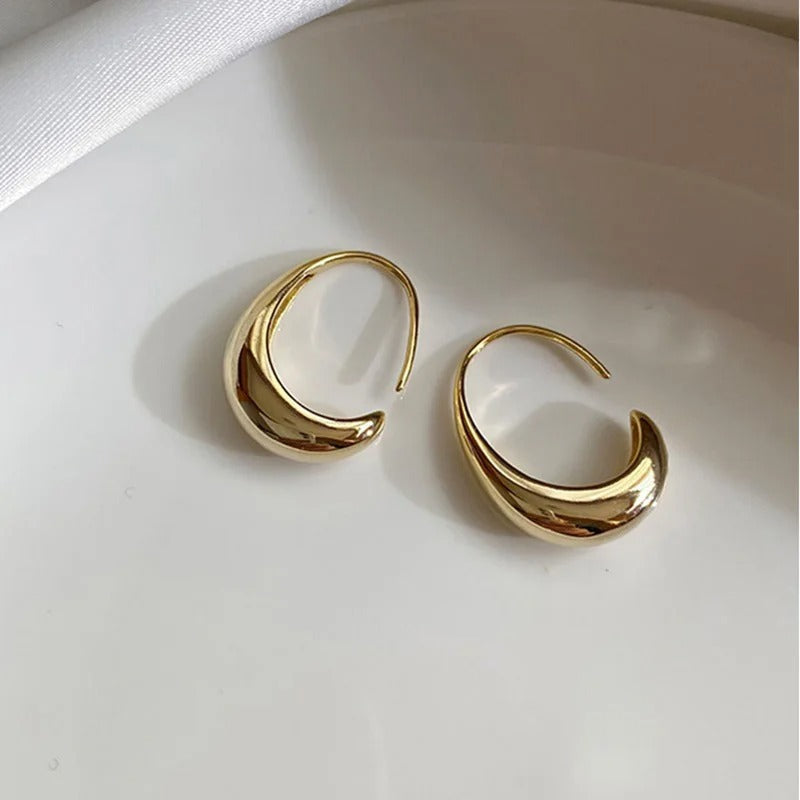 Pendientes vintage en forma de luna creciente dorada y brillante