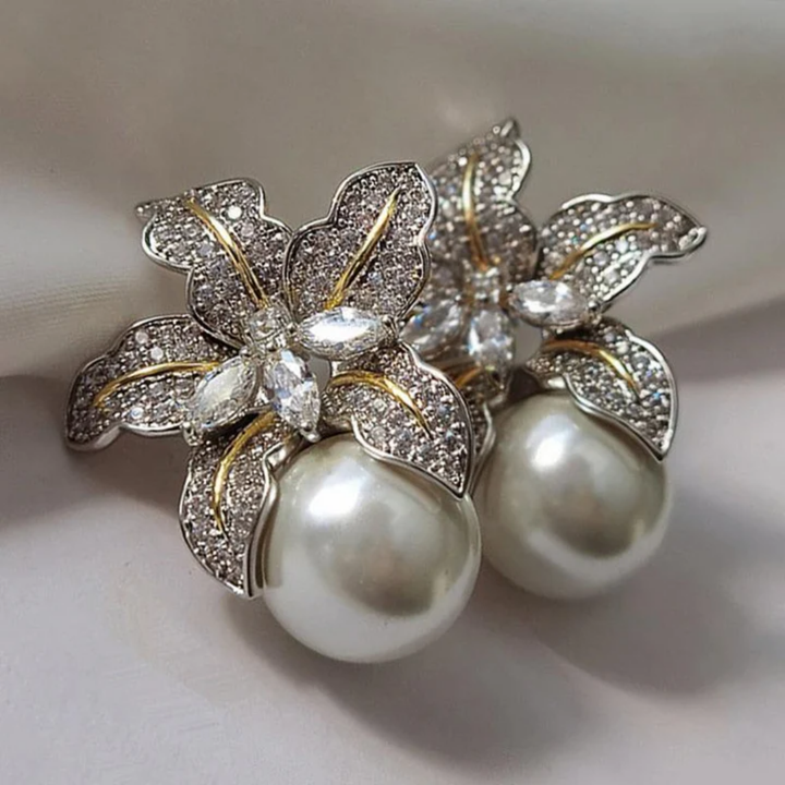 Elegantes pendientes con flor y perla