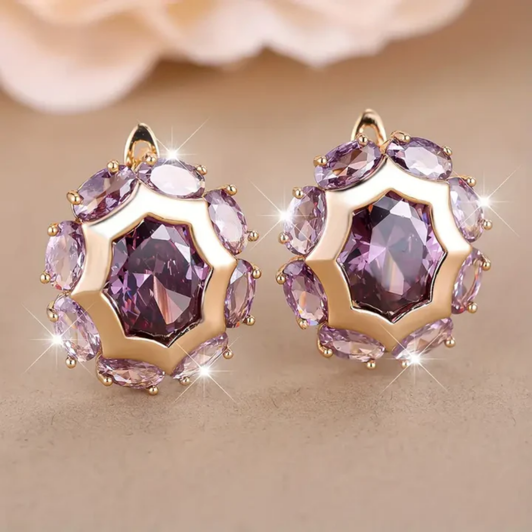 Pendientes redondos de oro con circonita violeta