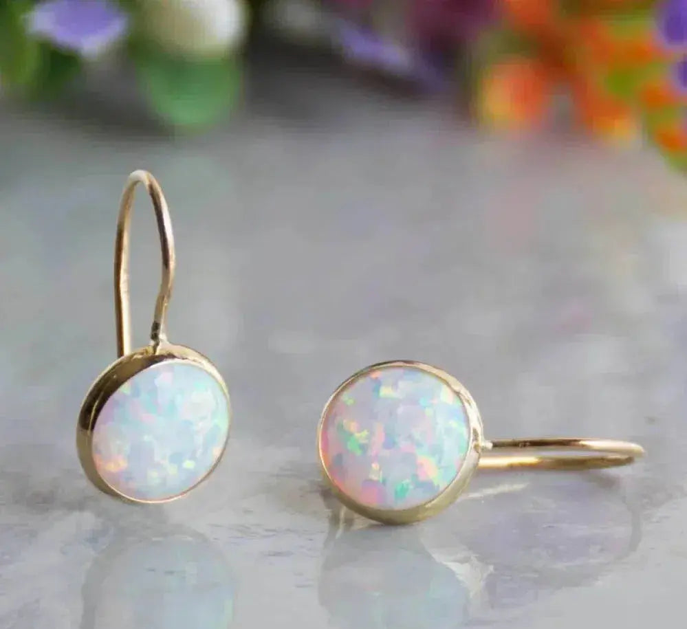 Pendientes vintage de oro con piedra de ópalo